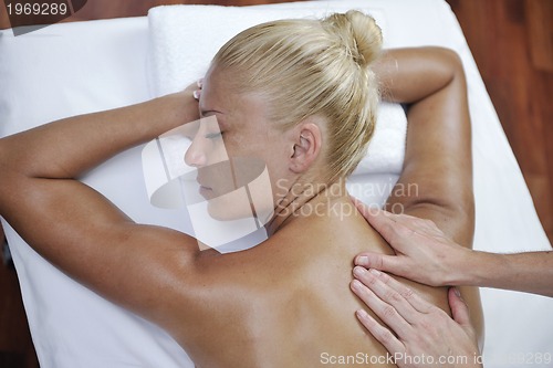 Image of woman back massage treatment