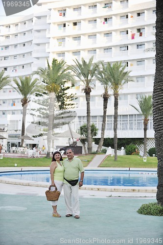 Image of happy seniors couple  on beach