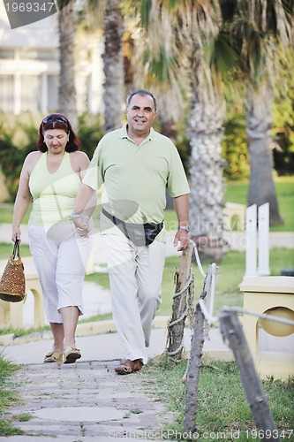 Image of happy seniors couple  on beach