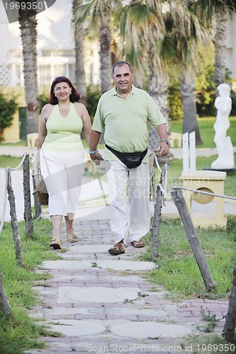 Image of happy seniors couple  on beach