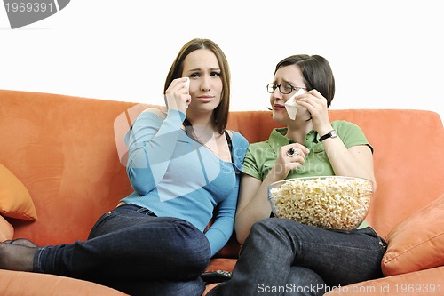 Image of two woman watching television 