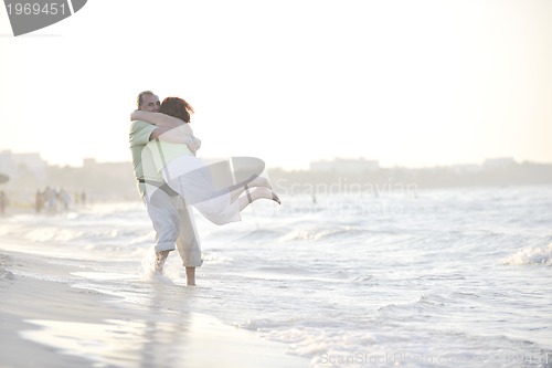 Image of happy seniors couple  on beach