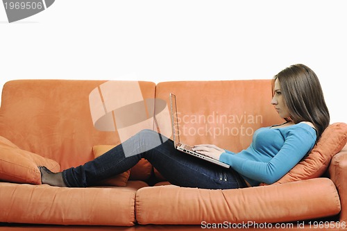 Image of one young woman working on laptop