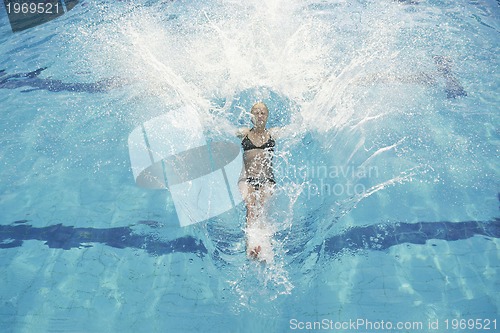 Image of woman relax on swimming pool