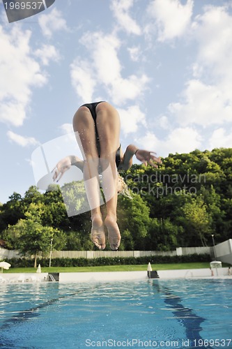 Image of woman relax on swimming pool