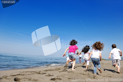 Image of happy young  people group have fun on beach