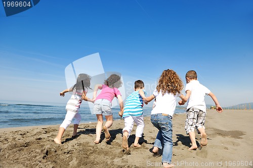 Image of happy young  people group have fun on beach