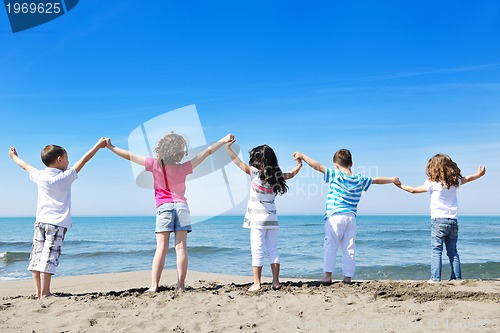 Image of kids playing on beach