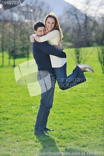 Image of happy couple outdoor