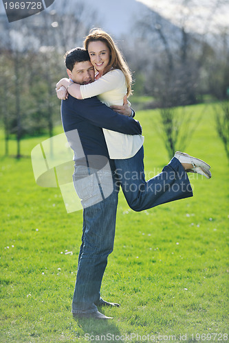 Image of happy couple outdoor