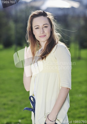 Image of young woman outdoor portrait