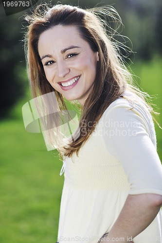 Image of young woman outdoor portrait