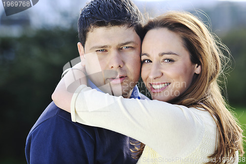 Image of happy couple outdoor