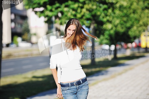 Image of young woman havefun at street 