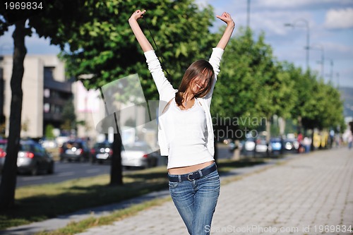 Image of young woman havefun at street 