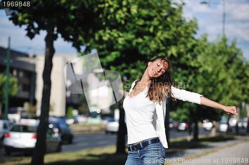 Image of young woman havefun at street 