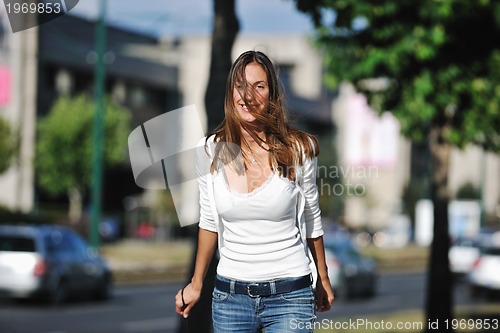 Image of young woman havefun at street 