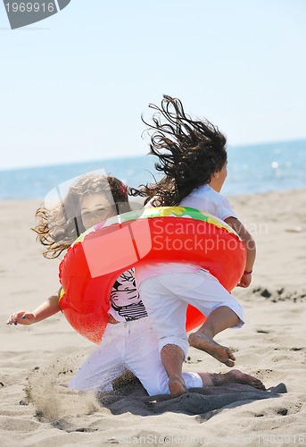 Image of happy young  people group have fun on beach