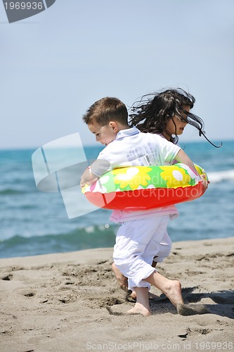 Image of happy young  people group have fun on beach