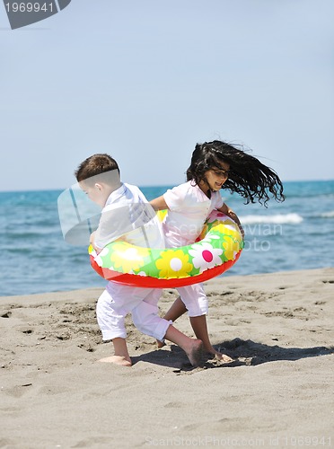 Image of happy young  people group have fun on beach