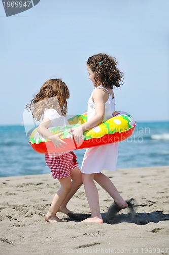 Image of happy young  people group have fun on beach