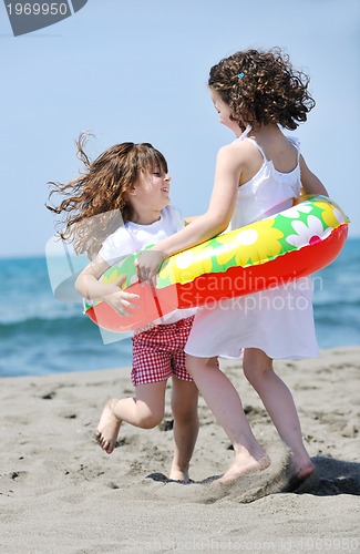 Image of happy young  people group have fun on beach