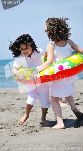 Image of happy young  people group have fun on beach