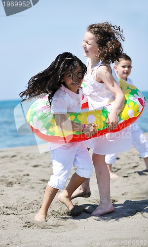 Image of happy young  people group have fun on beach