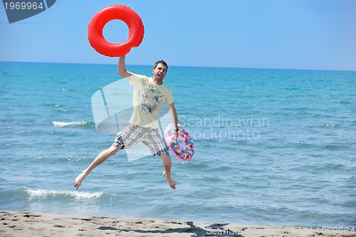 Image of man relax on beach