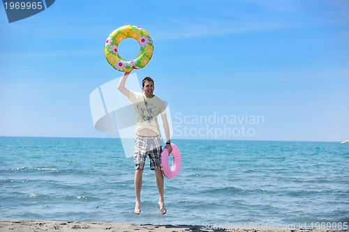 Image of man relax on beach