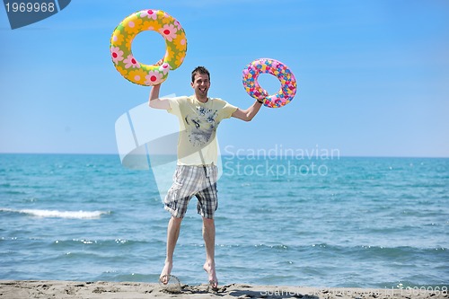 Image of man relax on beach