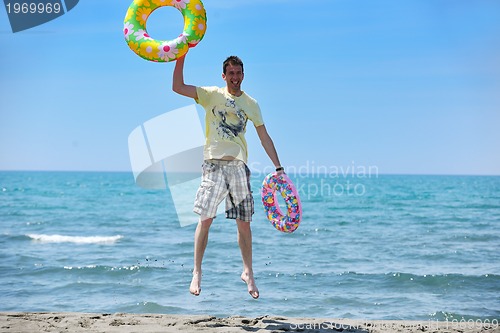 Image of man relax on beach