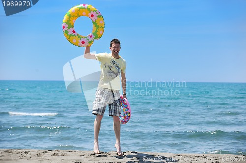 Image of man relax on beach