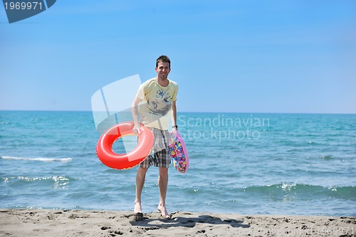 Image of man relax on beach