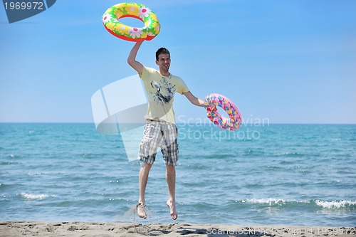 Image of man relax on beach