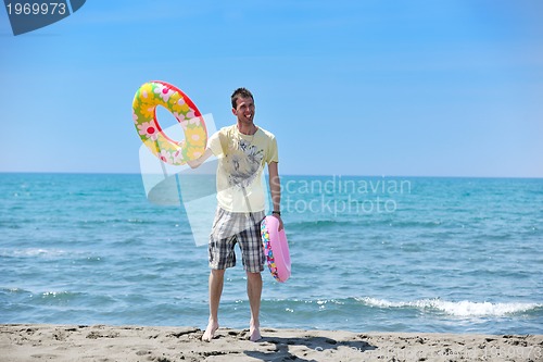 Image of man relax on beach