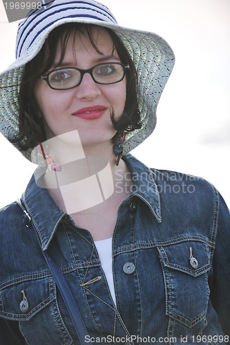 Image of young woman enjoy on beach