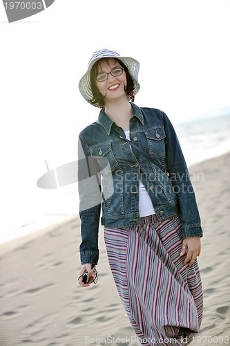 Image of young woman relax  on beach