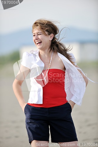 Image of young woman relax  on beach