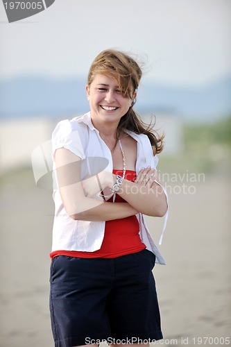 Image of young woman relax  on beach