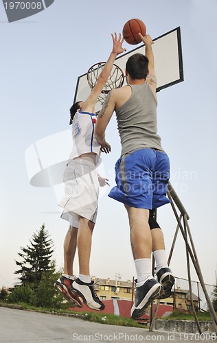 Image of streetball  game at early morning