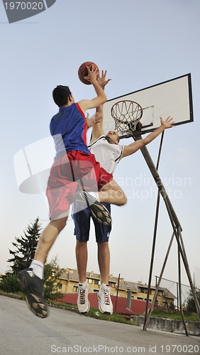 Image of streetball  game at early morning