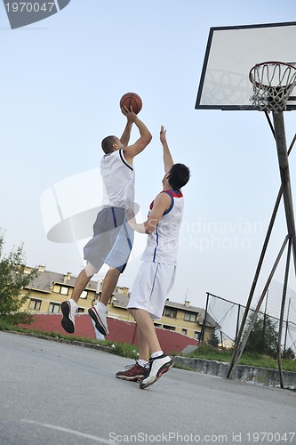 Image of streetball  game at early morning