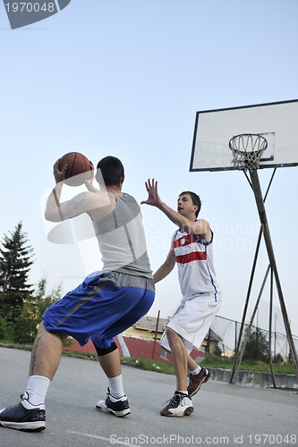 Image of streetball  game at early morning