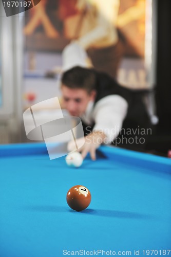 Image of young man play pro billiard game 