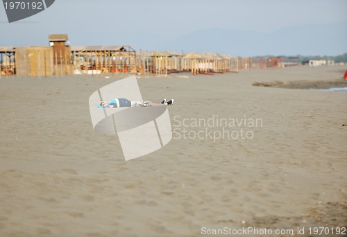 Image of man relax on beach