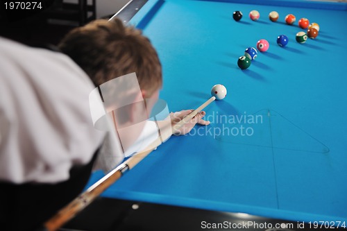 Image of young man play pro billiard game 