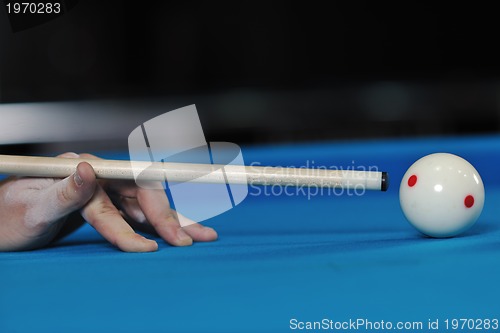 Image of young man play pro billiard game 