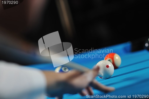 Image of young man play pro billiard game 