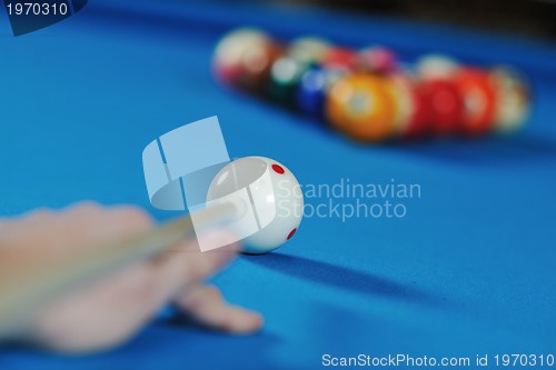 Image of young man play pro billiard game 